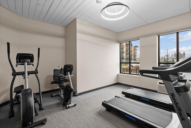 exercise room with baseboards