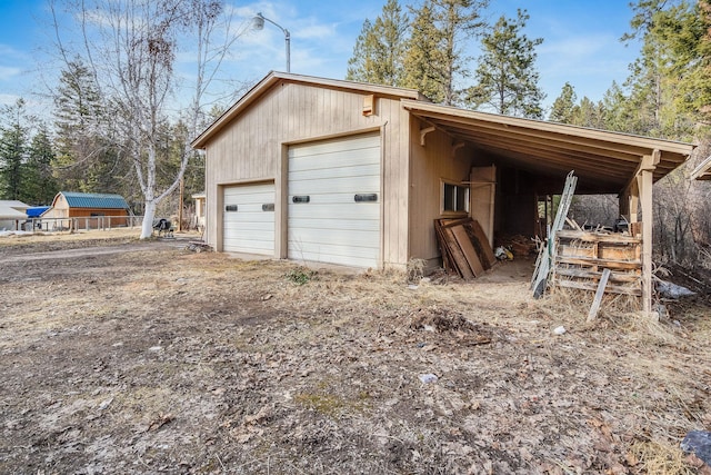 garage featuring a detached garage