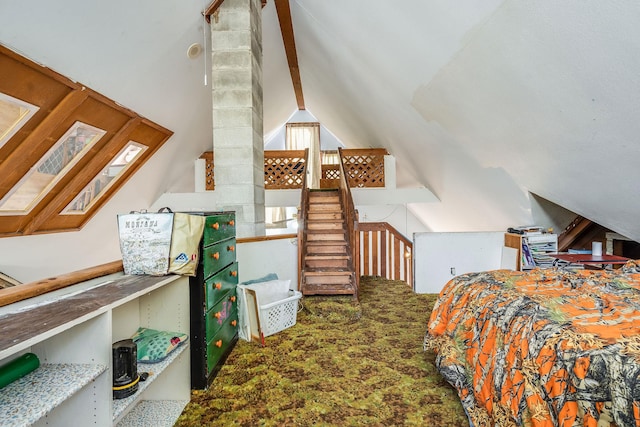 bedroom with lofted ceiling and carpet