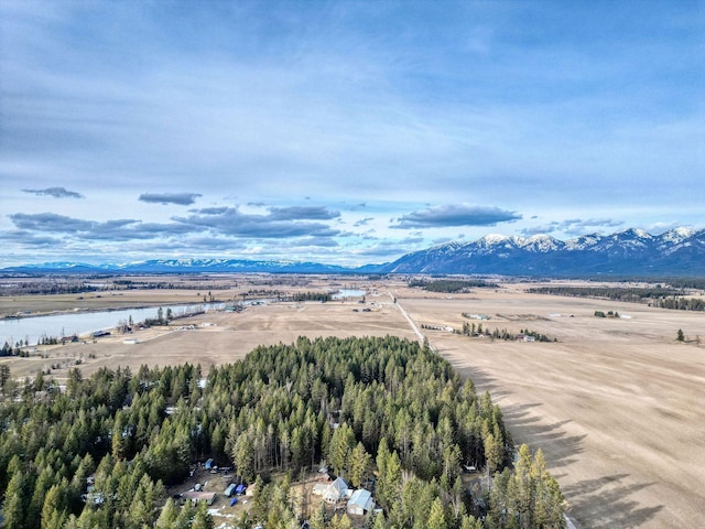 bird's eye view featuring a water and mountain view