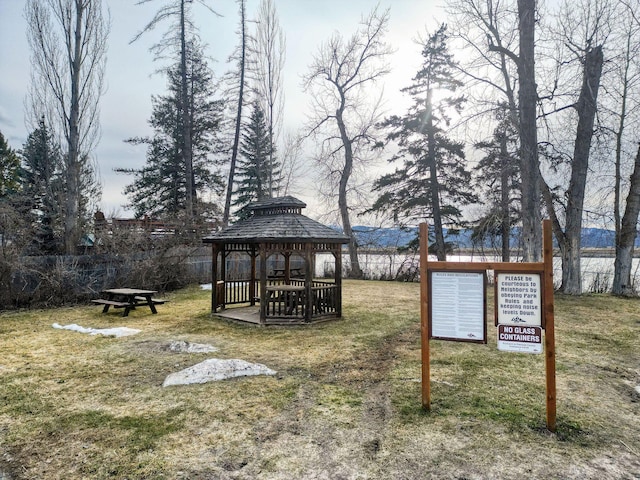 view of property's community featuring a gazebo and a lawn