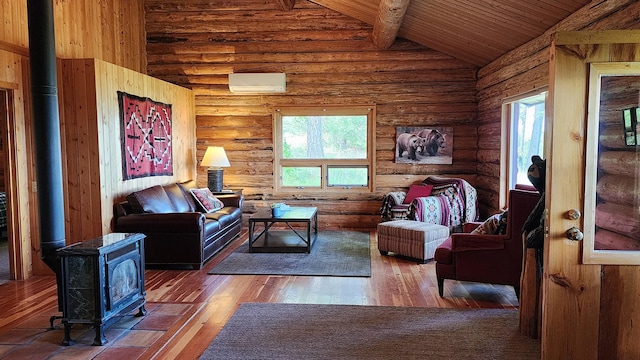 living room featuring high vaulted ceiling, hardwood / wood-style flooring, a wall unit AC, wood ceiling, and a wood stove