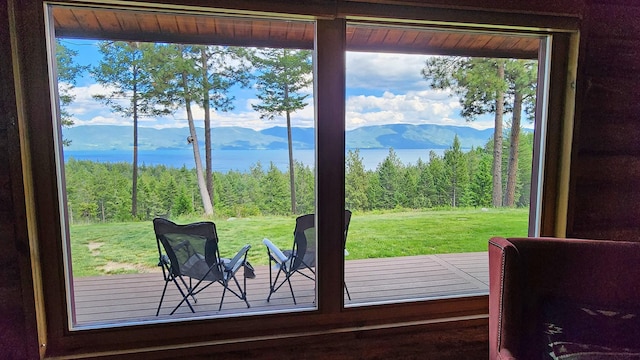 entryway featuring a water and mountain view