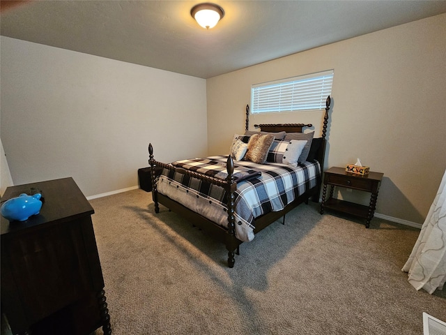 bedroom featuring visible vents, carpet flooring, and baseboards