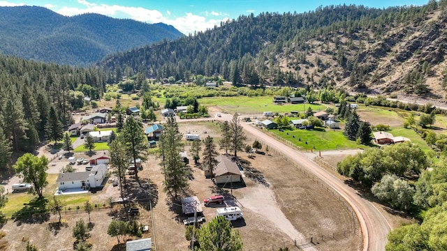 7415 Wildcat St, Helena, MT 59602 - aerial view of a mountain backdrop and a forest