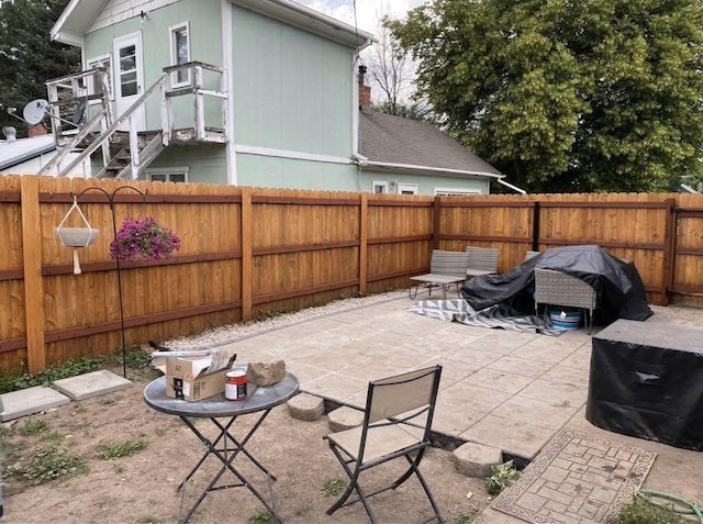 view of patio featuring a fenced backyard