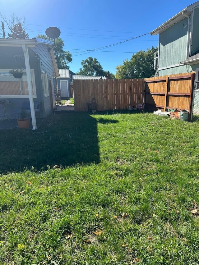 view of yard with fence