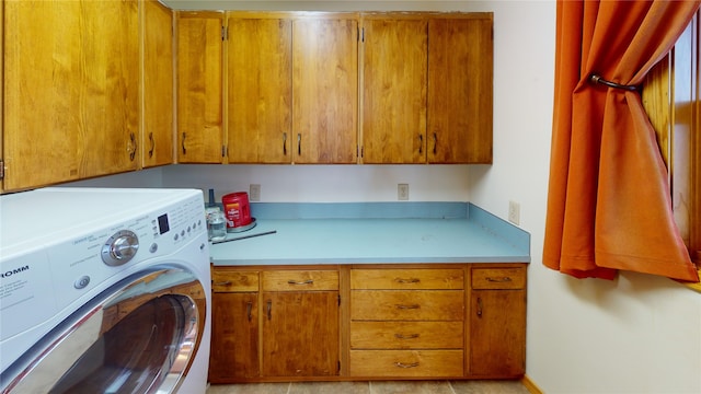 laundry area with cabinet space and washer / clothes dryer