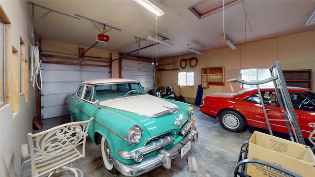 garage featuring a garage door opener