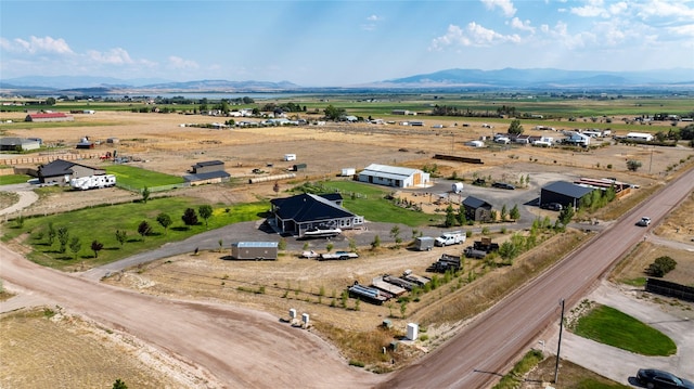 bird's eye view with a mountain view and a rural view