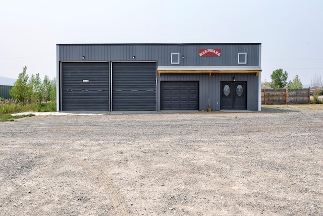 detached garage with fence