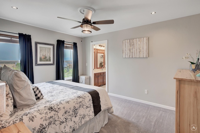 bedroom with connected bathroom, baseboards, carpet, recessed lighting, and a ceiling fan