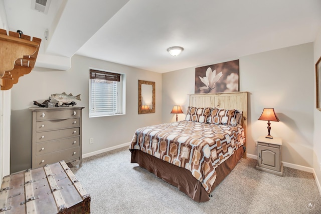 bedroom featuring visible vents, baseboards, and carpet flooring