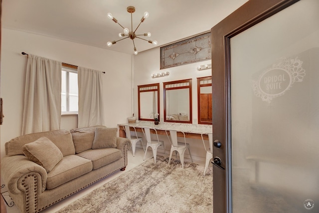 living area with a chandelier