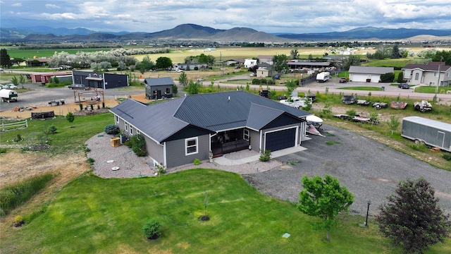 bird's eye view with a mountain view