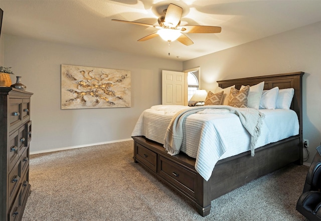 bedroom featuring light colored carpet, baseboards, and ceiling fan