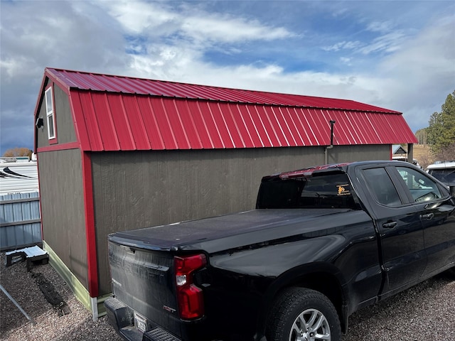 garage with fence