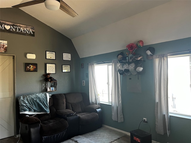 34813 Canyon Mill Rd, Ronan, MT 59864 - living area with lofted ceiling, ceiling fan, wood finished floors, and baseboards