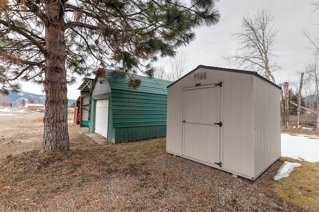 view of shed with a garage