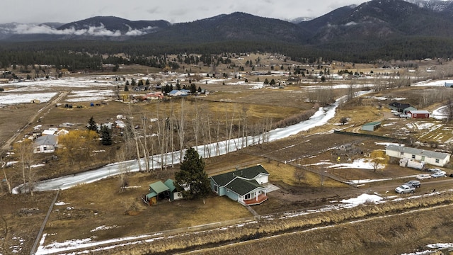 aerial view featuring a mountain view and a rural view