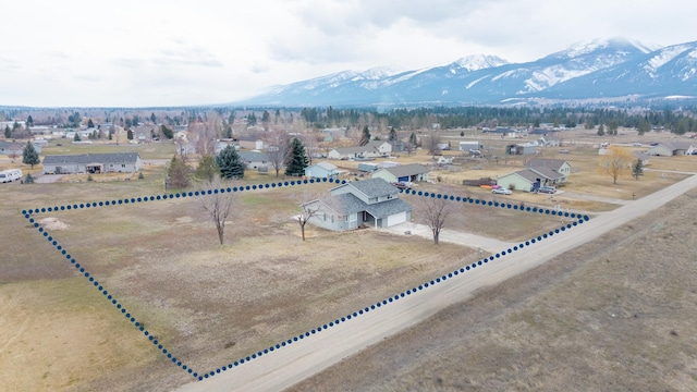 bird's eye view featuring a residential view and a mountain view