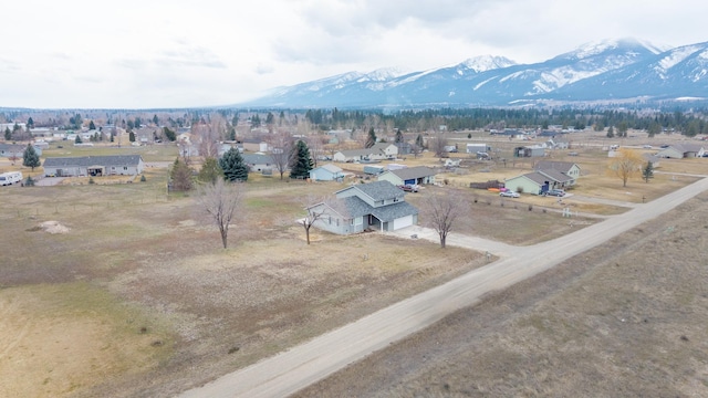 birds eye view of property featuring a mountain view and a residential view