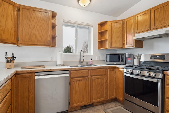 kitchen with visible vents, open shelves, a sink, under cabinet range hood, and appliances with stainless steel finishes