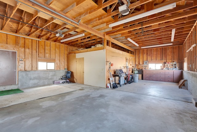 garage featuring a garage door opener