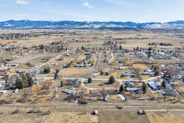 birds eye view of property featuring a mountain view