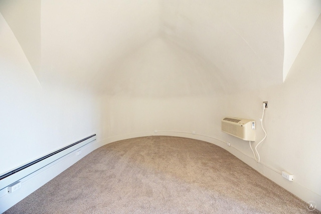 empty room with baseboard heating, a wall unit AC, and carpet floors