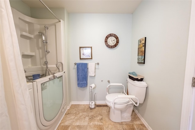 full bath with a shower, baseboards, washer / clothes dryer, and toilet