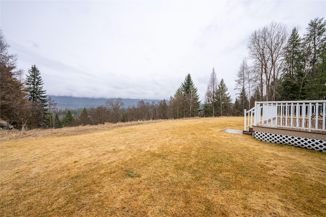 view of yard with a deck