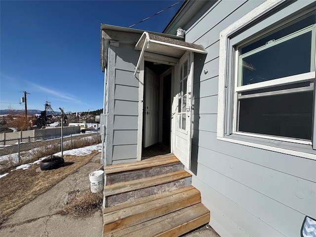 property entrance featuring fence