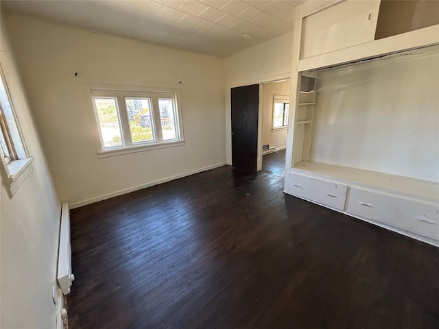 420 Virginia St, Butte, MT 59701 - unfurnished bedroom with dark wood finished floors and baseboards