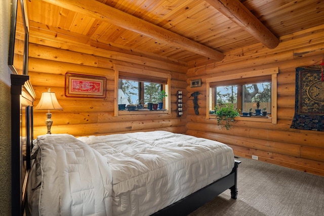 32 Peaceful Ct, Bigfork, MT 59911 - bedroom featuring a wood ceiling with exposed beams, multiple windows, and log walls