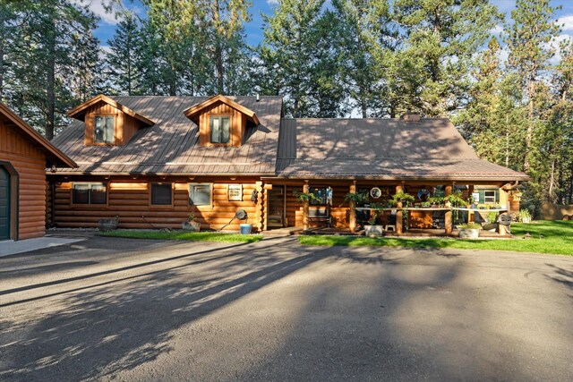 32 Peaceful Ct, Bigfork, MT 59911 - log-style house featuring log exterior