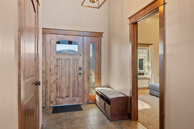 entryway with tile patterned floors