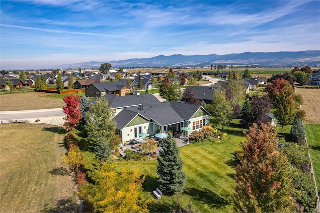 aerial view with a mountain view and a residential view