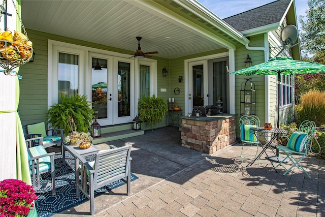 view of patio / terrace with french doors and ceiling fan