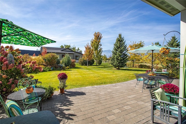 view of patio with outdoor dining area