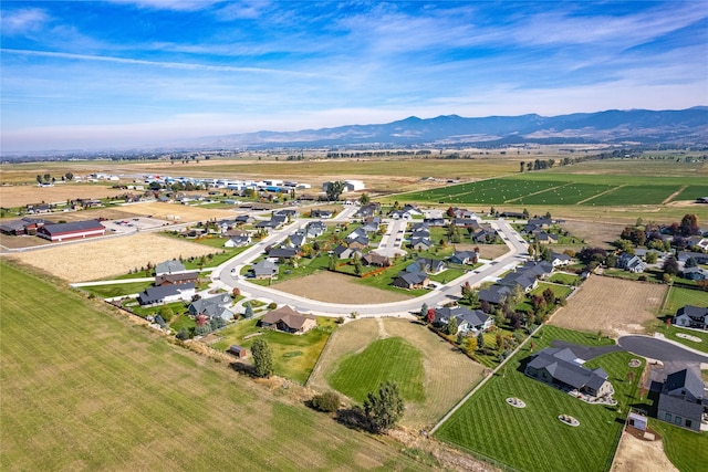 birds eye view of property featuring a mountain view and a residential view