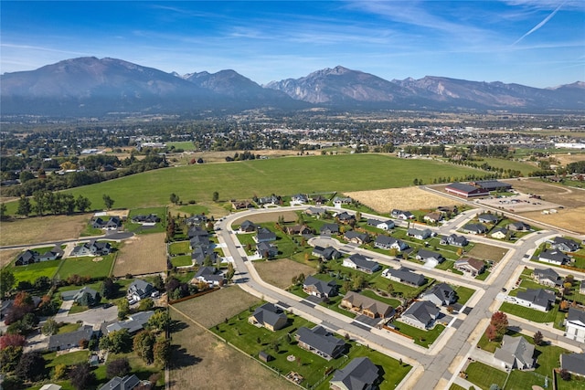 drone / aerial view with a residential view and a mountain view