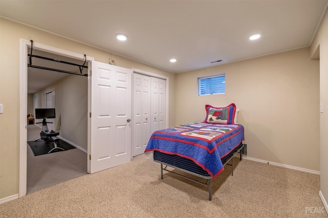 carpeted bedroom featuring visible vents, recessed lighting, and baseboards