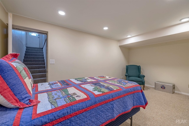 carpeted bedroom featuring recessed lighting and baseboards