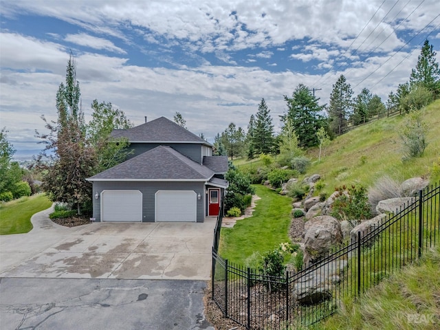 view of property exterior featuring concrete driveway, fence, a garage, and roof with shingles