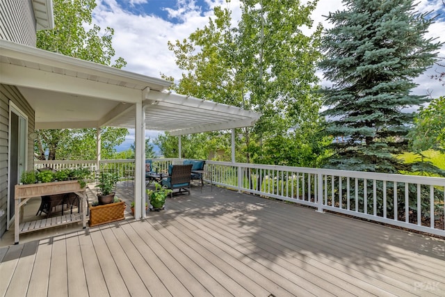 wooden deck with outdoor dining space