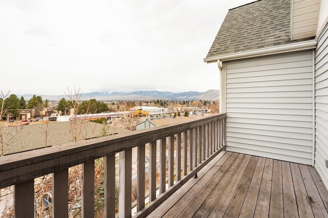 wooden terrace featuring a mountain view