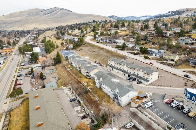 drone / aerial view with a residential view and a mountain view