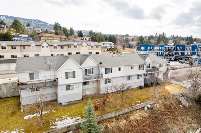 aerial view featuring a mountain view and a residential view