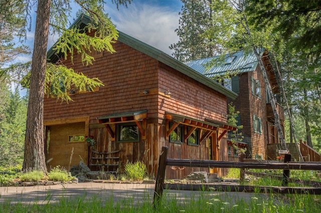 exterior space with metal roof